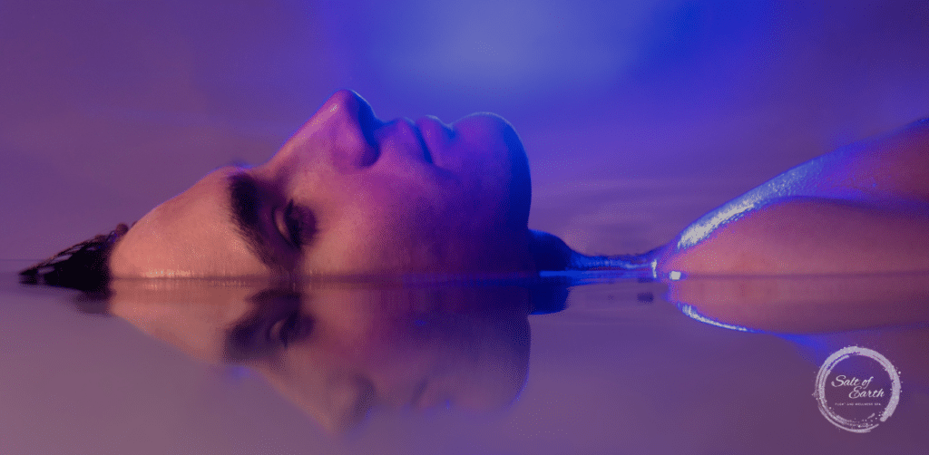 Man relaxing in an Epsom float tank in Ogden